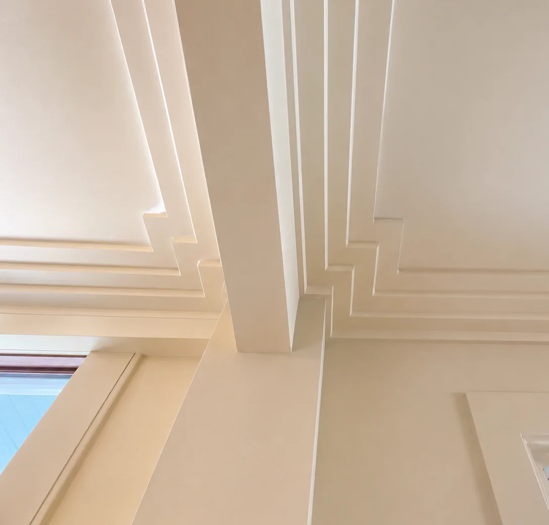 Custom crown molding and trim carpentry detail built by Paro Projects